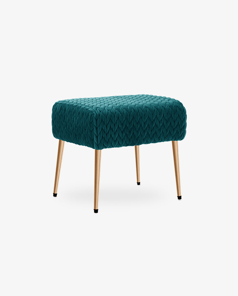A green woven ottoman with gold legs
