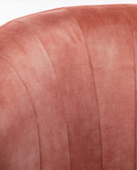 pink armless accent chair with comfy material