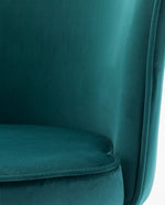 green velvet barrel chair details