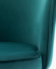 green velvet barrel chair details
